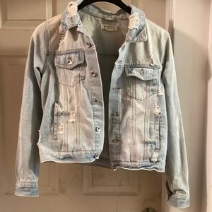 Distressed denim jacket